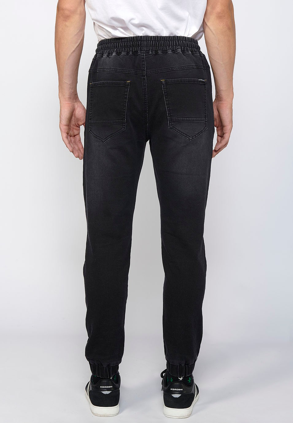 Pantalon de jogging long slim ajusté aux chevilles avec taille élastique réglable et cordon de serrage en Noir pour Homme 1