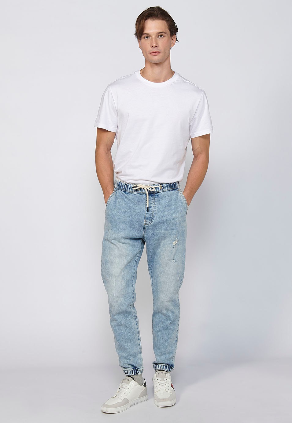 Pantalon de jogging long slim avec fermeture zippée et boutonnée sur le devant en Bleu pour Homme