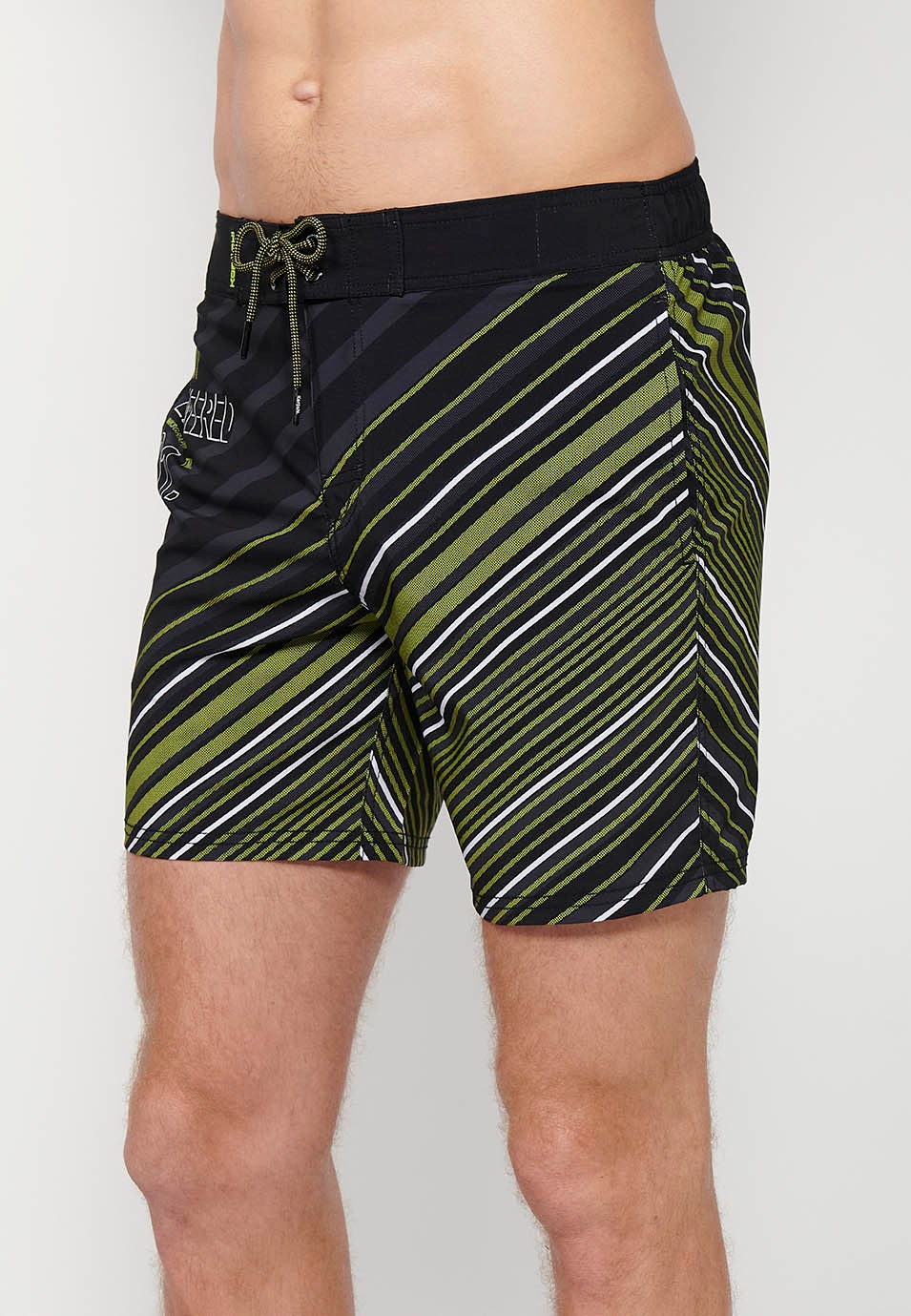 Printed short swimsuit with adjustable waist with drawstring and back pocket and one interior pocket in Lime Color for Men 1