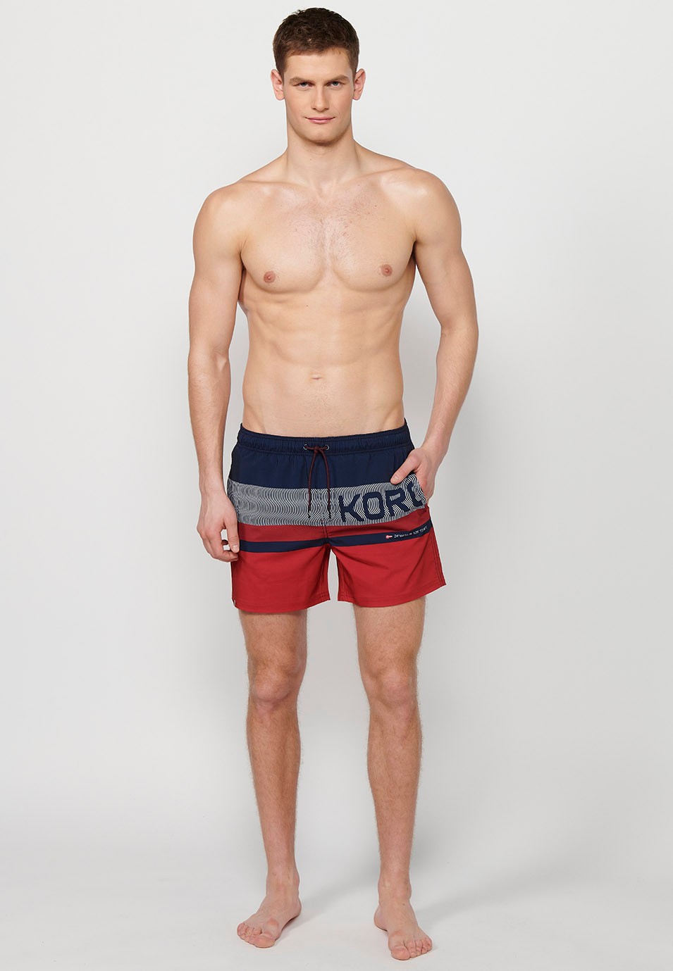 Printed short swimsuit with adjustable waist with drawstring and back pocket and one interior pocket in Navy for Men