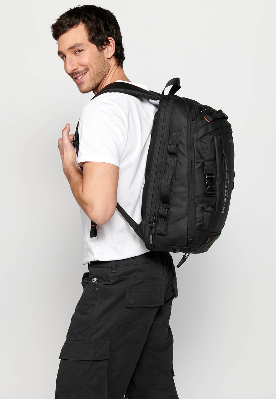 Koröshi backpack with two zippered compartments, one for a laptop and adjustable straps in Black 6