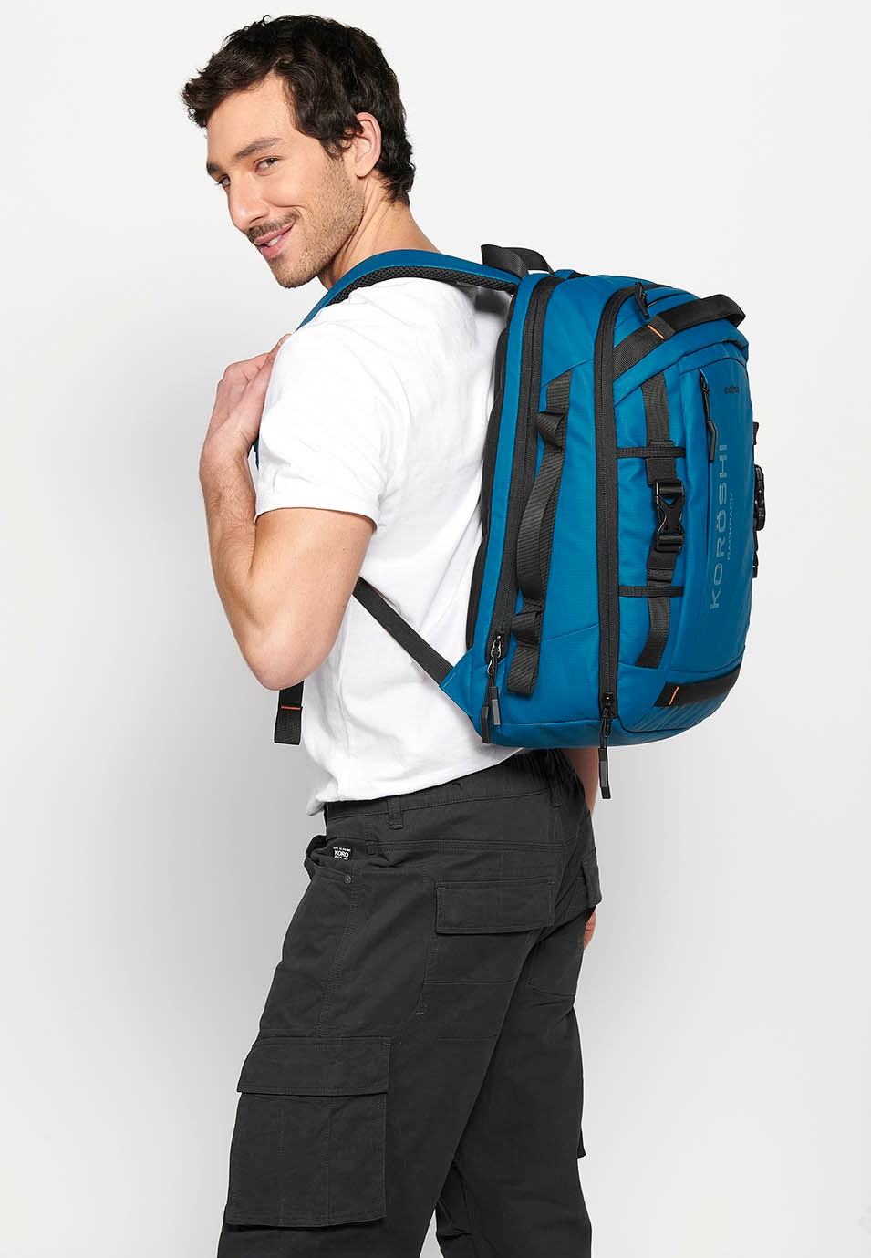 Koröshi backpack with two zippered compartments, one for a laptop and adjustable straps in Blue 5