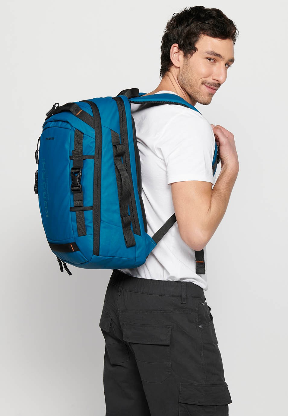 Koröshi backpack with two zippered compartments, one for a laptop and adjustable straps in Blue 7