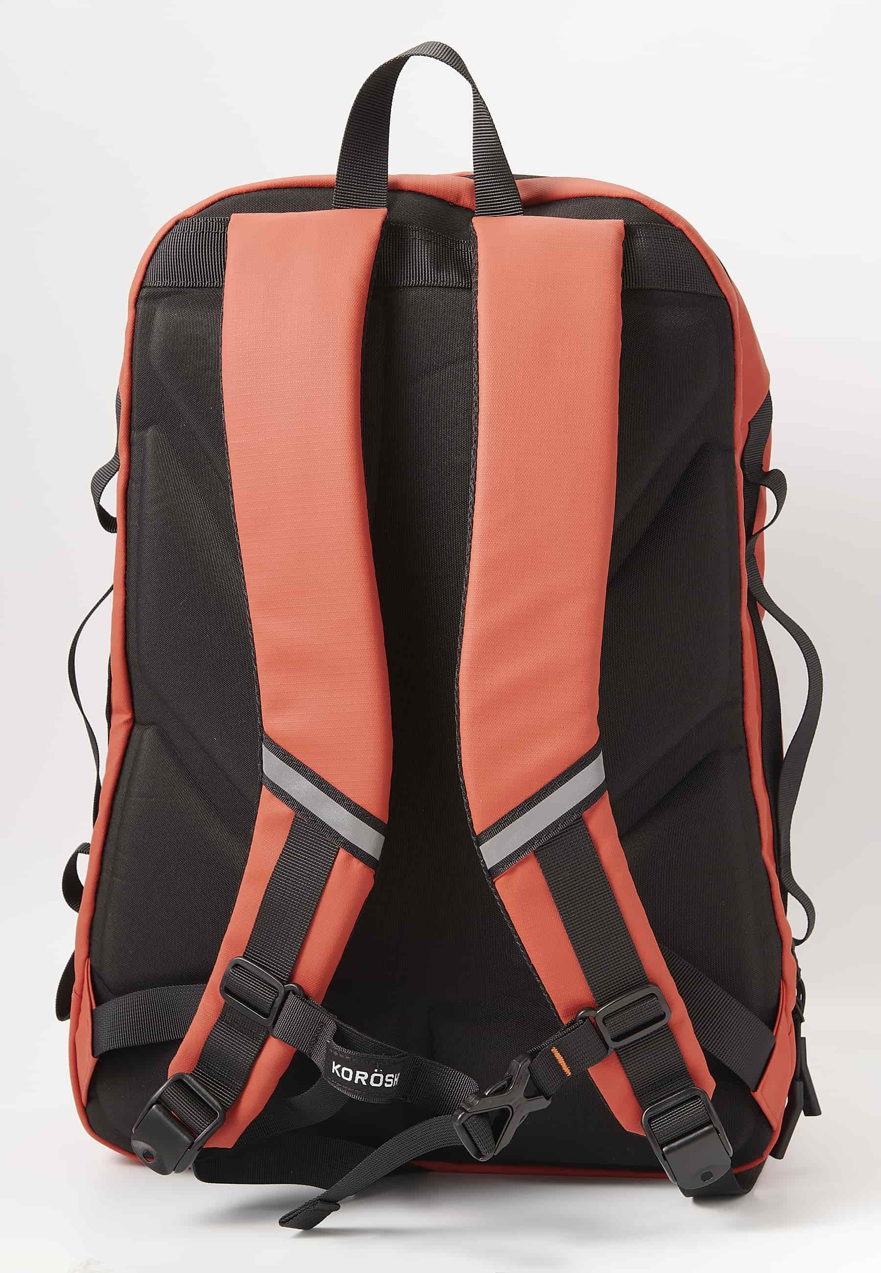 Koröshi backpack with two zippered compartments, one for a laptop and adjustable straps in Red