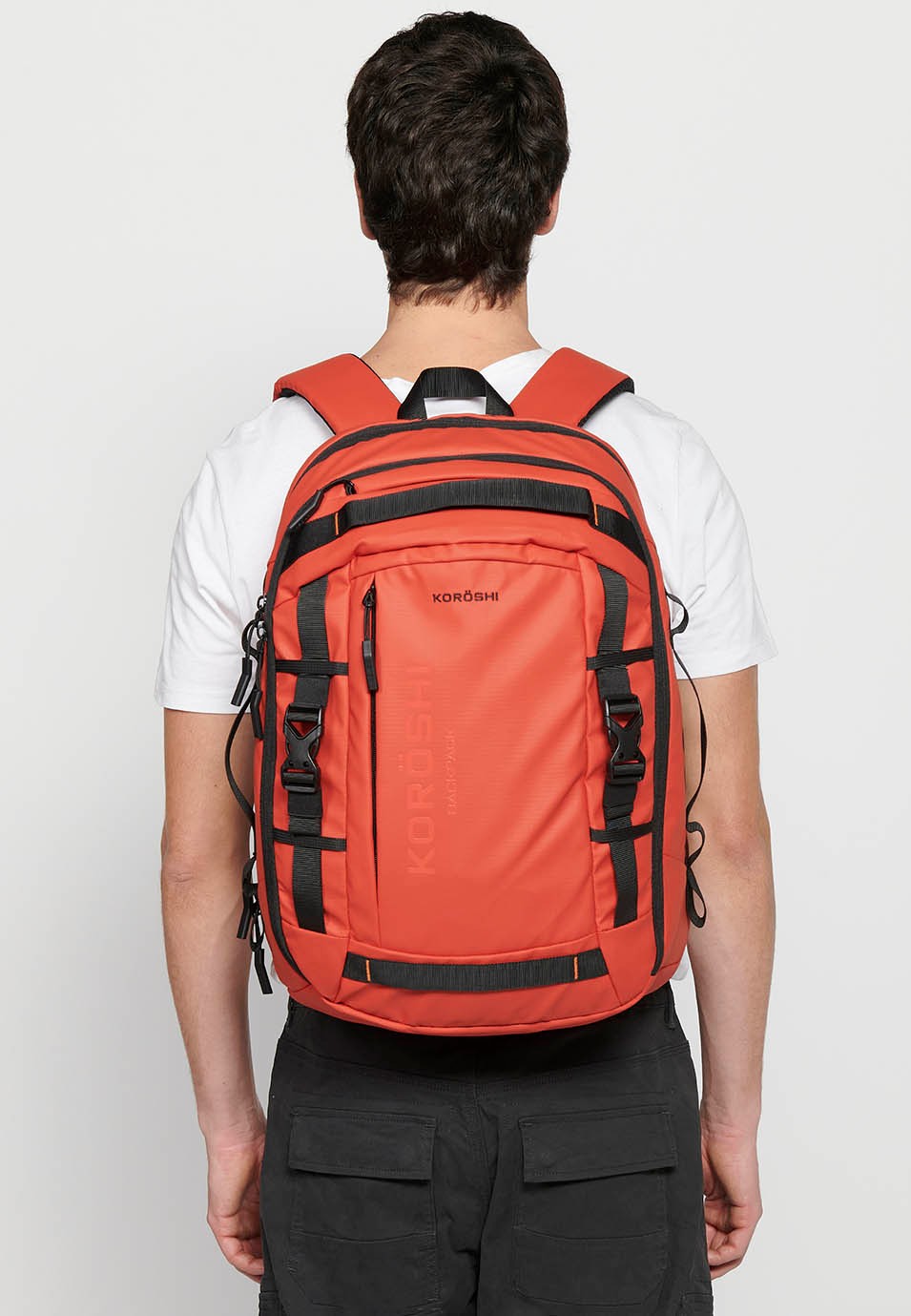Koröshi backpack with two zippered compartments, one for a laptop and adjustable straps in Red 7