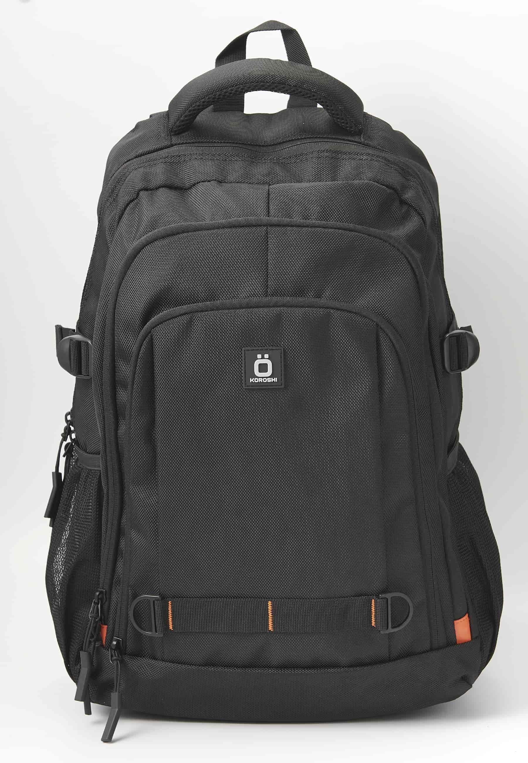 Koröshi backpack with three zippered compartments, one for a laptop, with black interior pockets