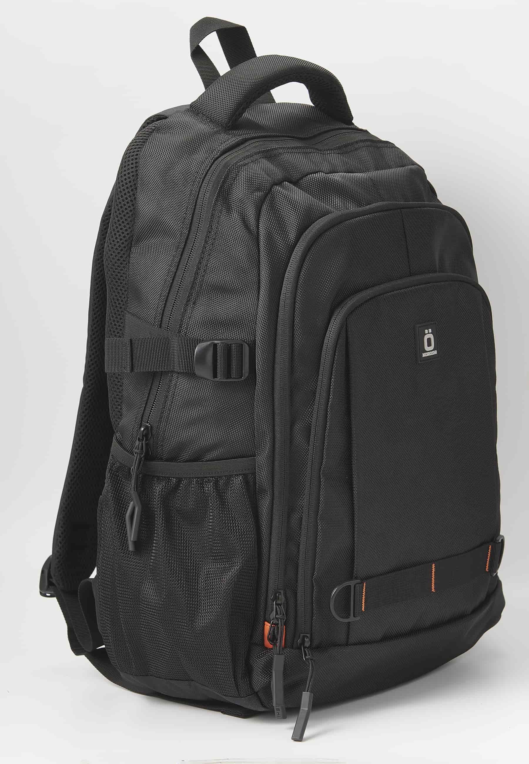 Mochila koröshi con tres compartimentos cerrados con cremallera, uno para portátil, con bolsillos interiores color negro | Estilo y Comodidad