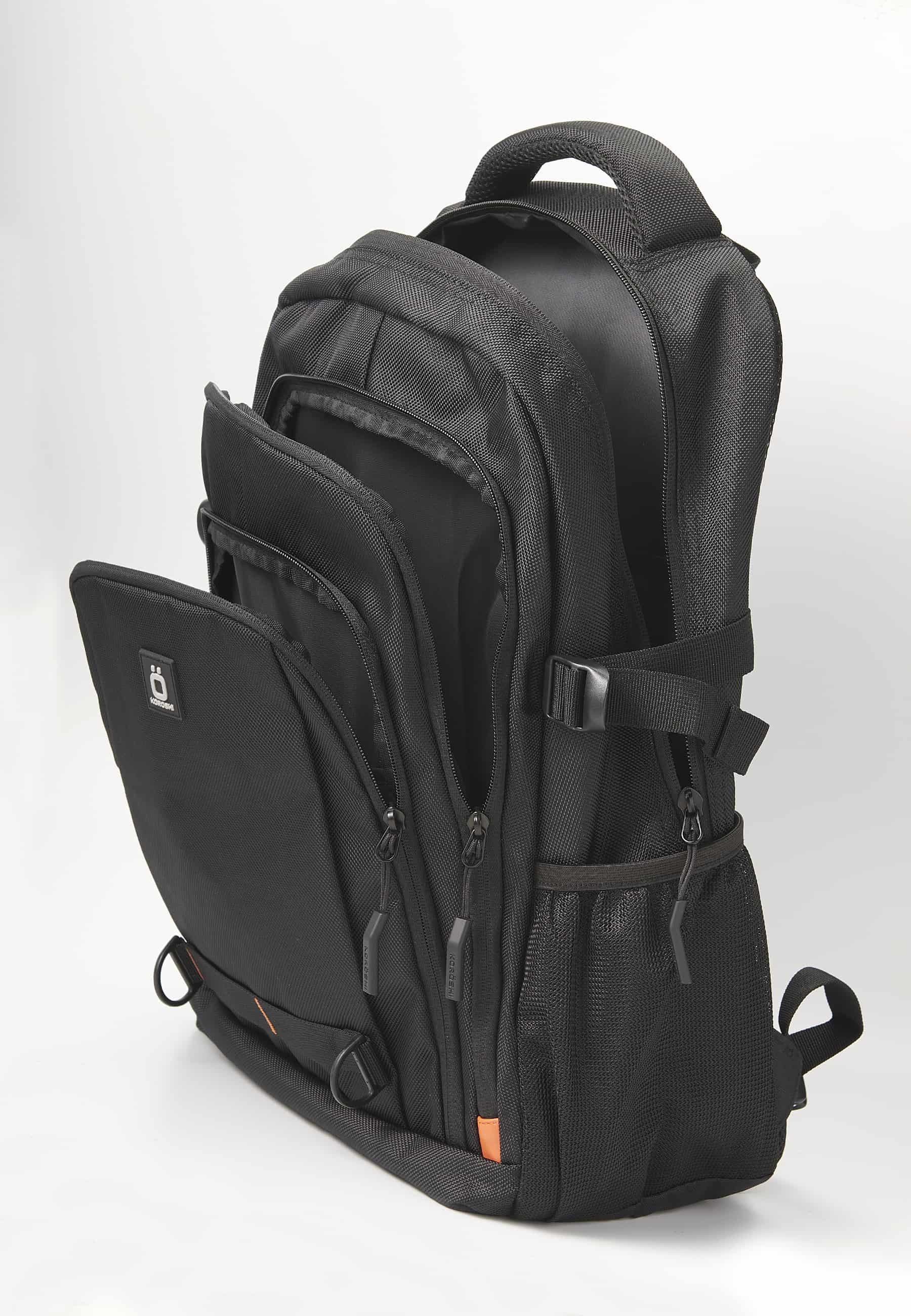 Mochila koröshi con tres compartimentos cerrados con cremallera, uno para portátil, con bolsillos interiores color negro | Estilo y Comodidad