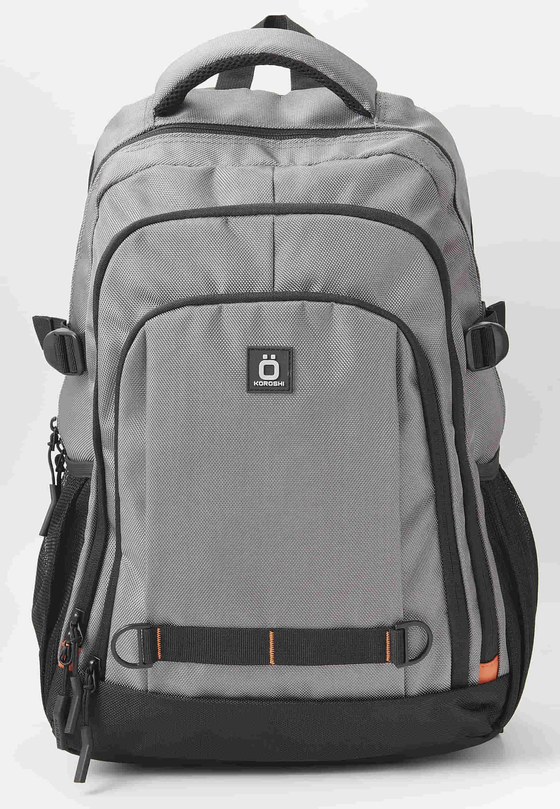 Mochila koröshi con tres compartimentos cerrados con cremallera, uno para portátil, con bolsillos interiores color gris | Estilo y Comodidad