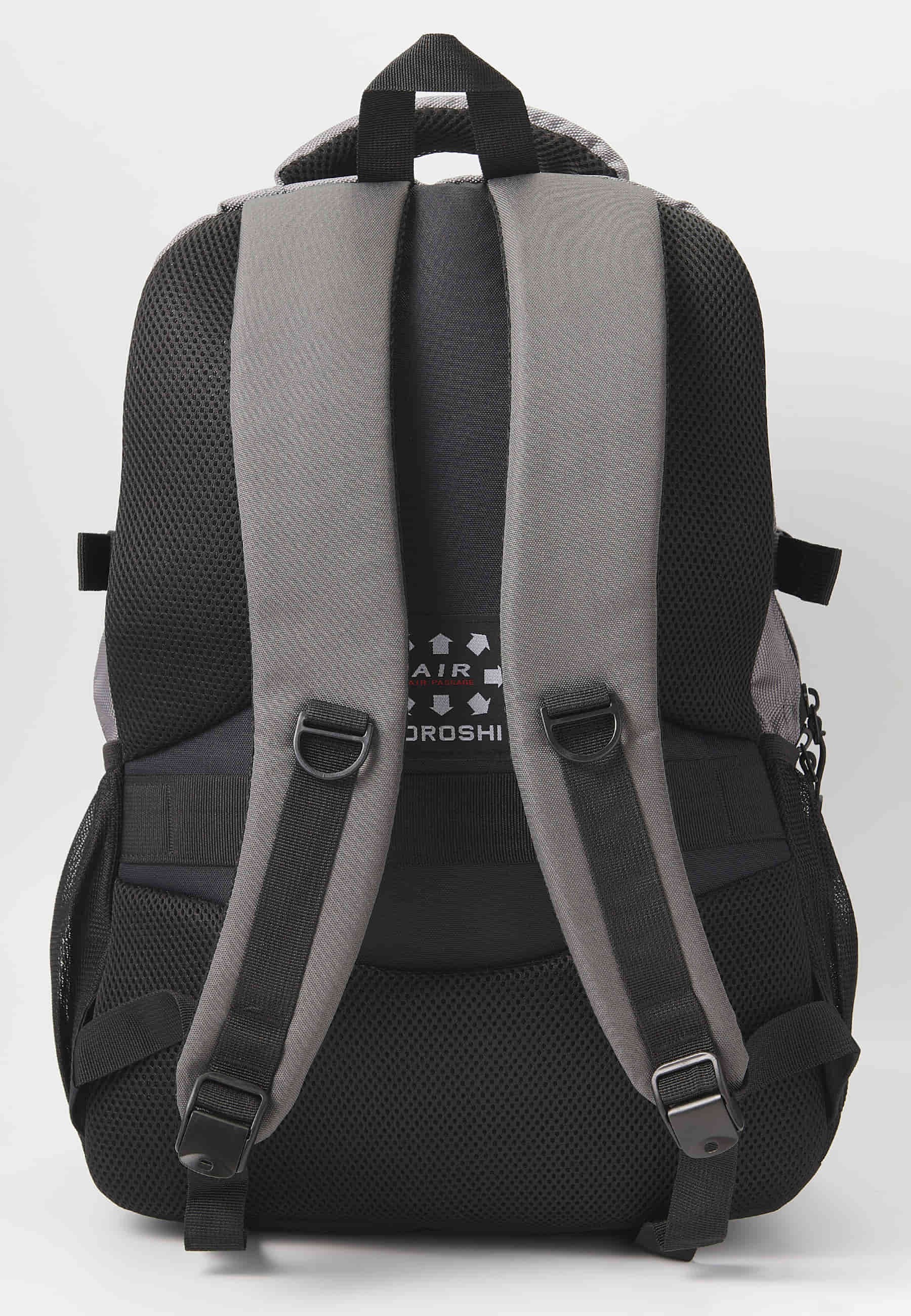 Mochila koröshi con tres compartimentos cerrados con cremallera, uno para portátil, con bolsillos interiores color gris | Estilo y Comodidad