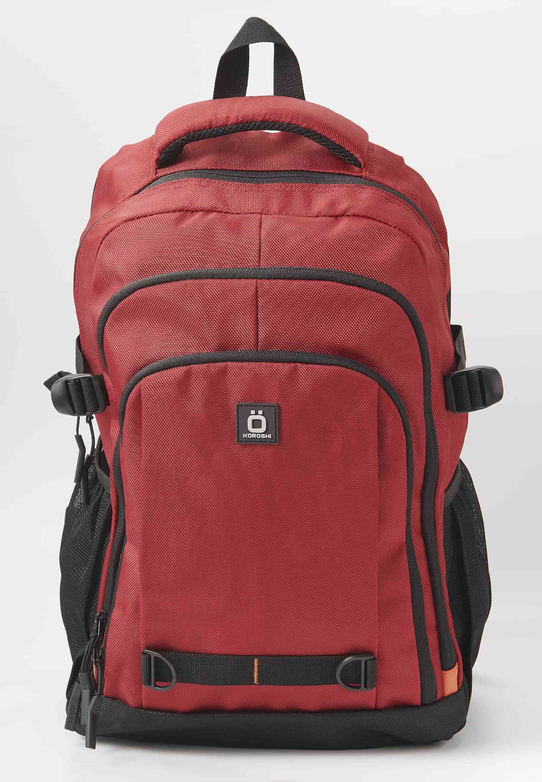 Koröshi backpack with three zippered compartments, one for laptop, with red interior pockets