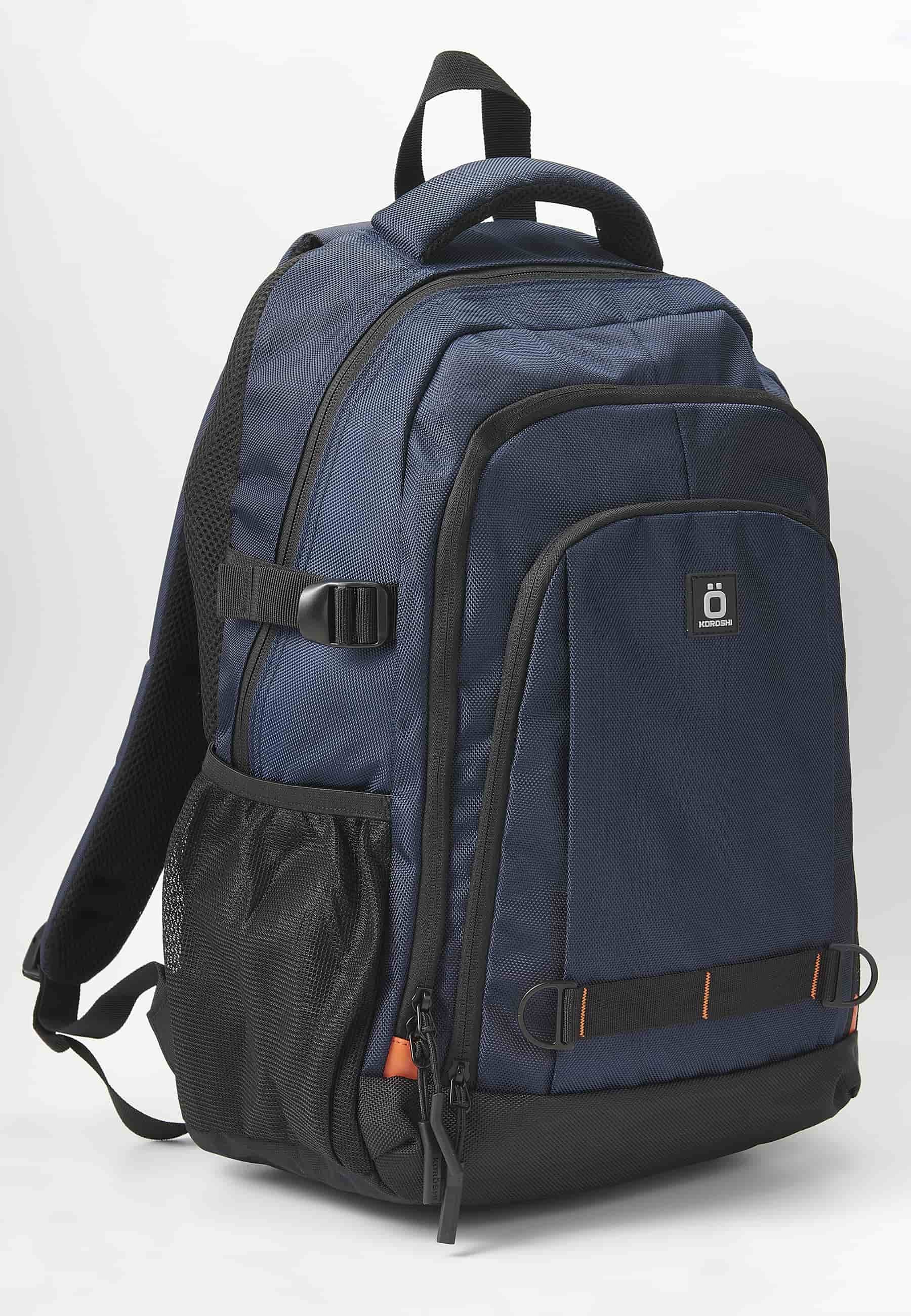 Mochila koröshi con tres compartimentos cerrados con cremallera, uno para portátil, con bolsillos interiores color navy | Estilo y Comodidad