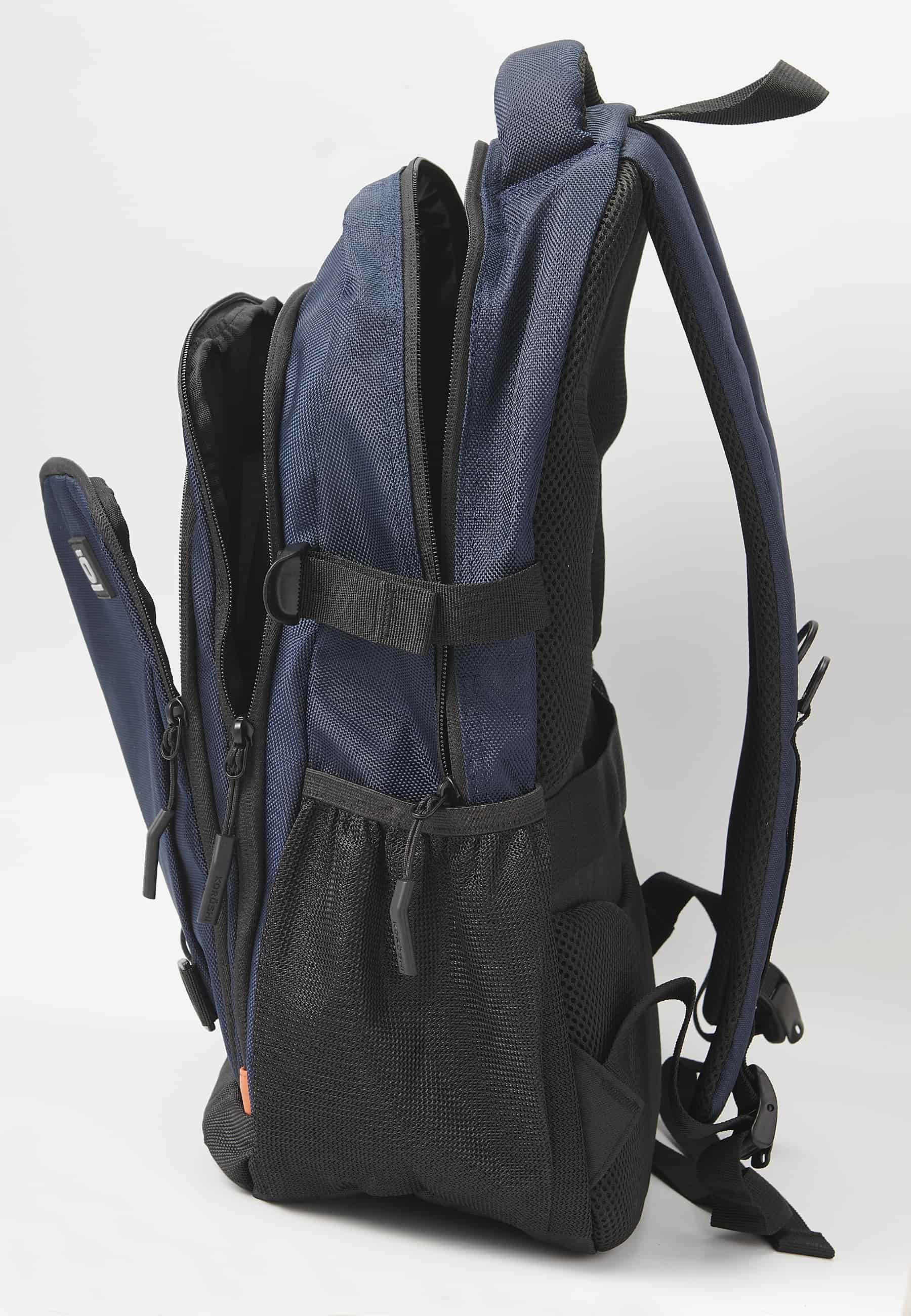 Mochila koröshi con tres compartimentos cerrados con cremallera, uno para portátil, con bolsillos interiores color navy | Estilo y Comodidad