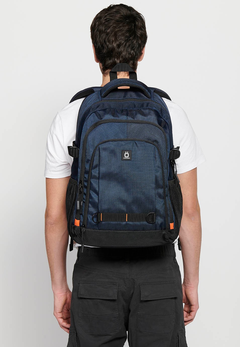 Koröshi backpack with three zippered compartments, one for a laptop, with Navy interior pockets 7