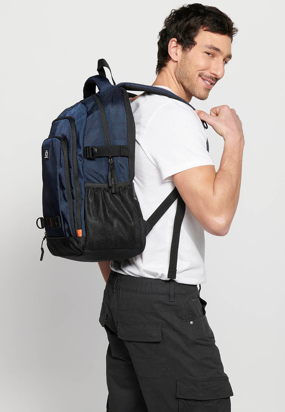 Koröshi backpack with three zippered compartments, one for a laptop, with Navy interior pockets 6