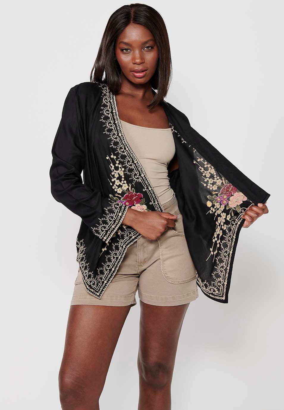 Offene Jacke mit Schirmabschlüssen und floralen Stickdetails in Schwarz für Damen 10