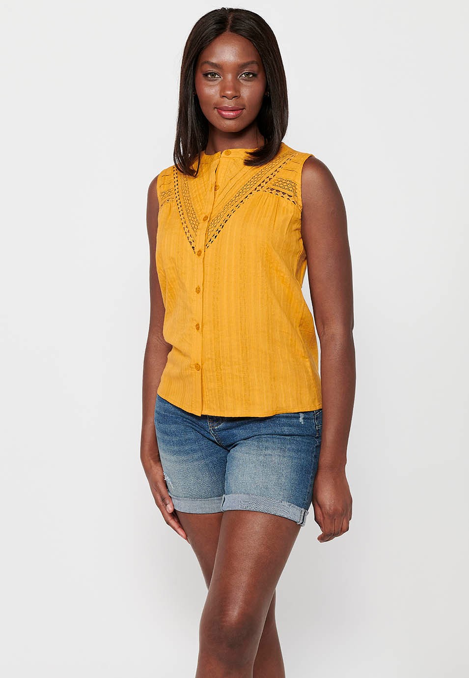 Sleeveless Cotton Blouse with Round Neck and Front Closure with Buttons and Embroidered Details in Mustard Color for Women