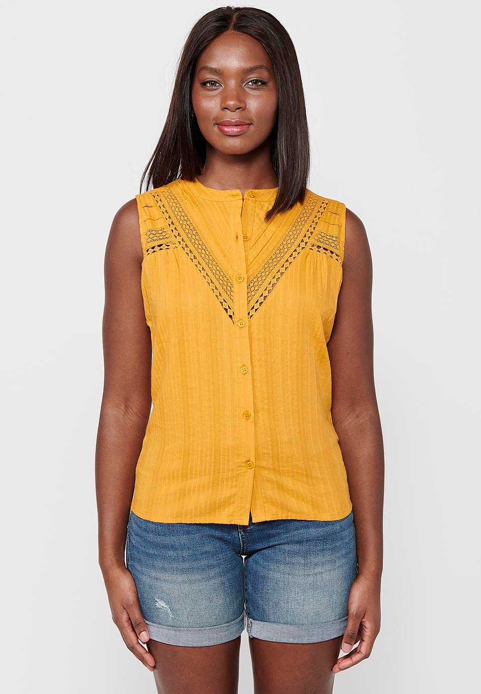 Sleeveless Cotton Blouse with Round Neck and Front Closure with Buttons and Embroidered Details in Mustard Color for Women 1