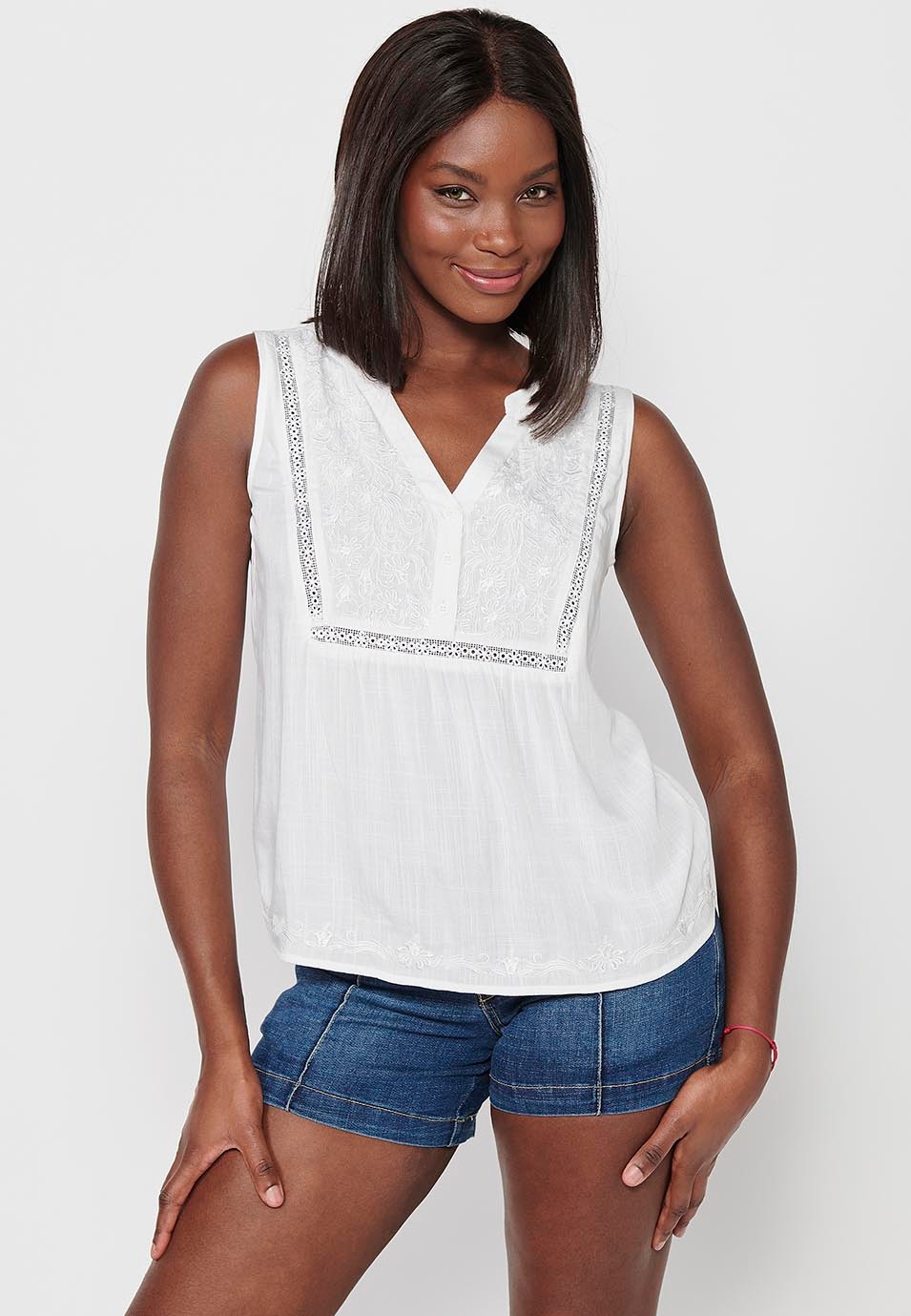 Blusa sin mangas con bordado delantero floral, color blanco para mujer | Moda Actual