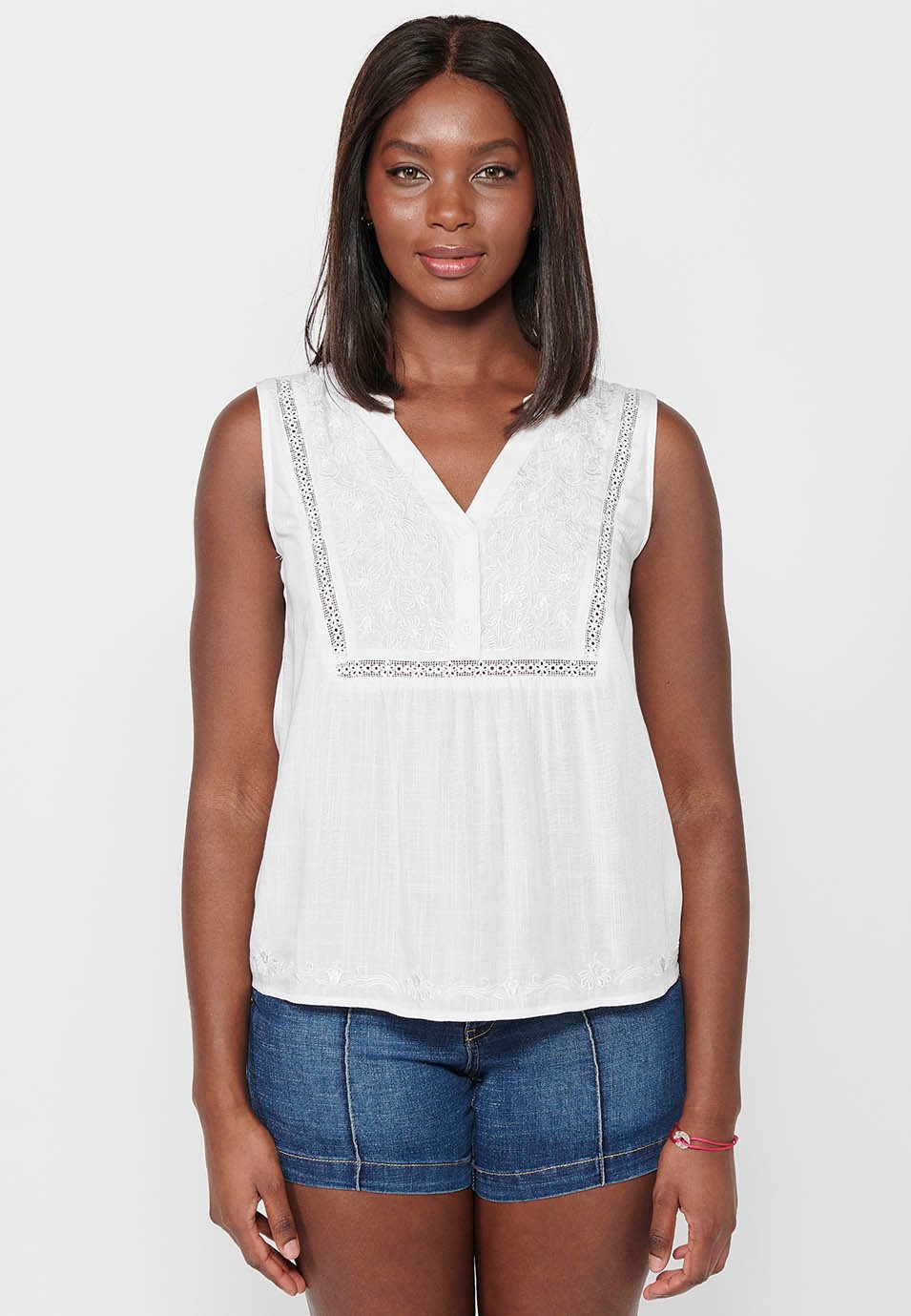 Blusa sin mangas con bordado delantero floral, color blanco para mujer | Moda Actual
