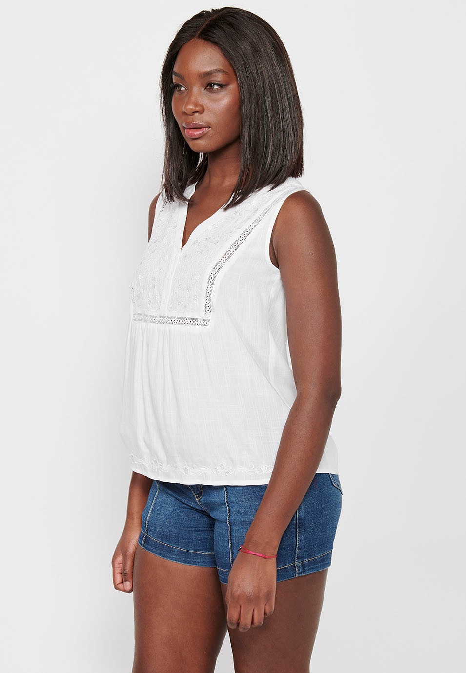 Blusa sin mangas con bordado delantero floral, color blanco para mujer | Moda Actual