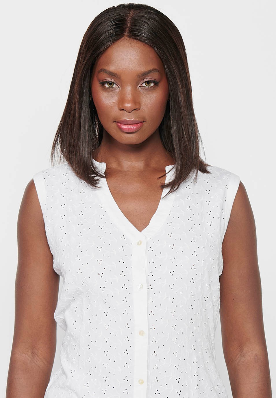 Blouse en coton sans manches avec fermeture sur le devant et boutons blancs pour femme 5