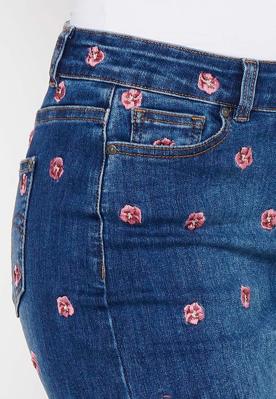 Short denim skirt made of embroidered fabric with front zipper closure and dark blue button for Women 6