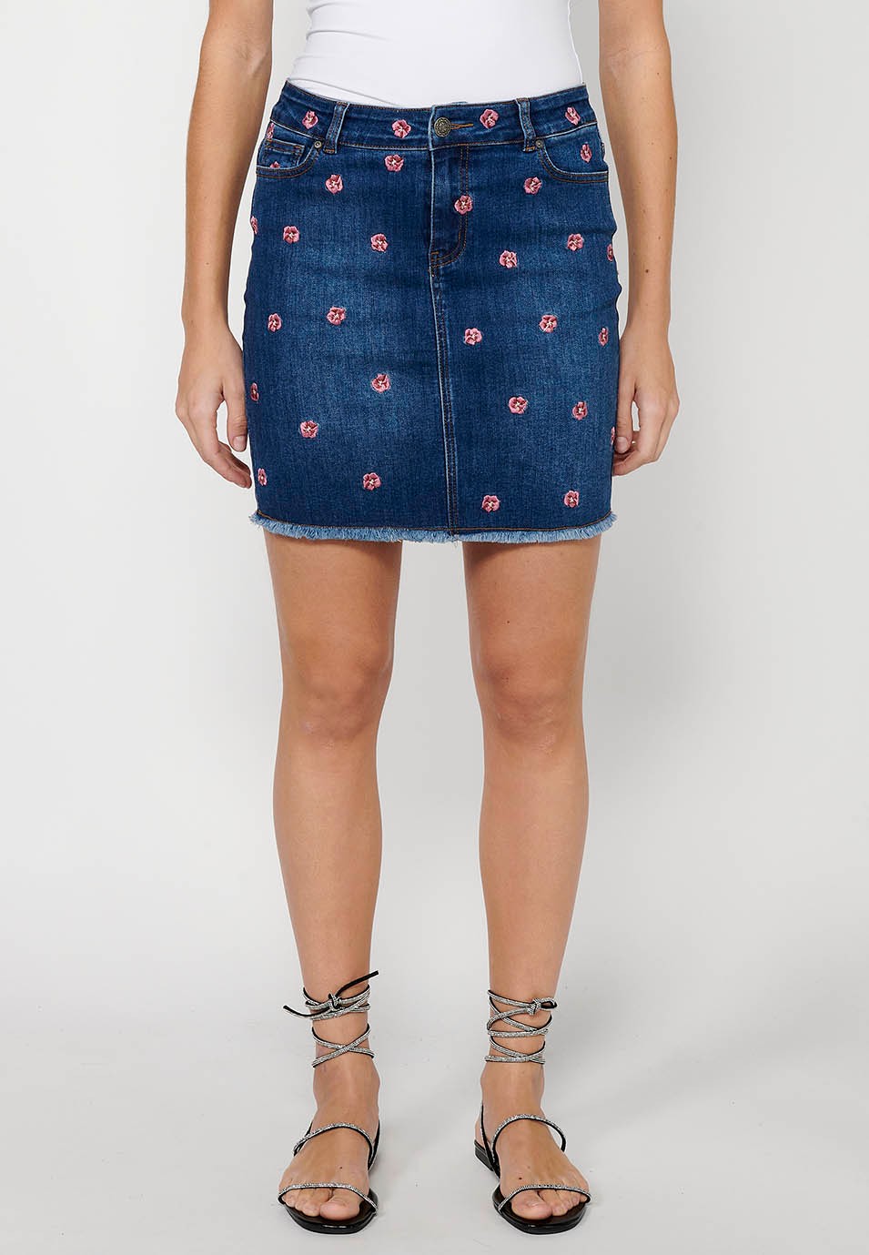 Short denim skirt made of embroidered fabric with front zipper closure and dark blue button for Women 4