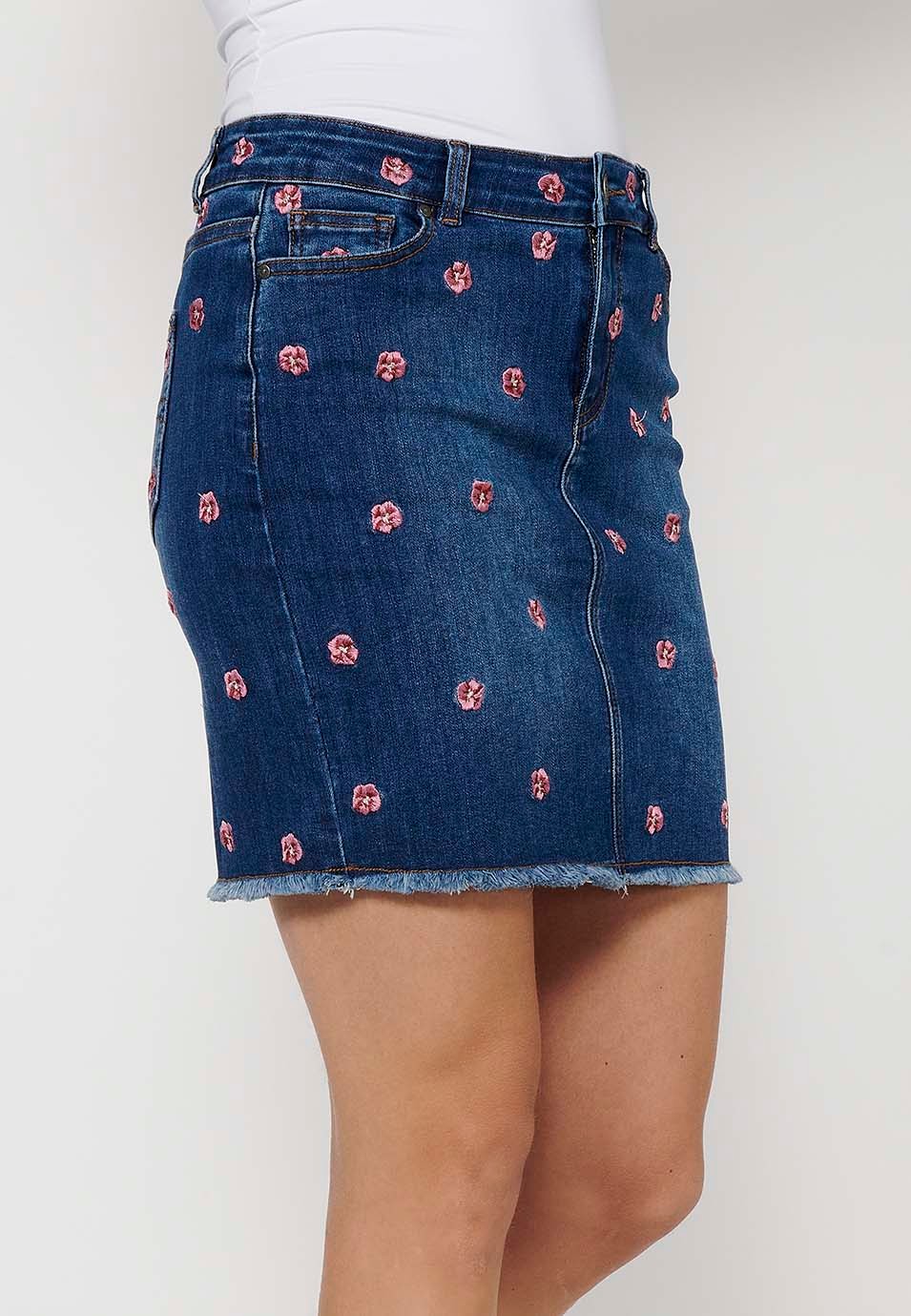 Short denim skirt made of embroidered fabric with front zipper closure and dark blue button for Women 2
