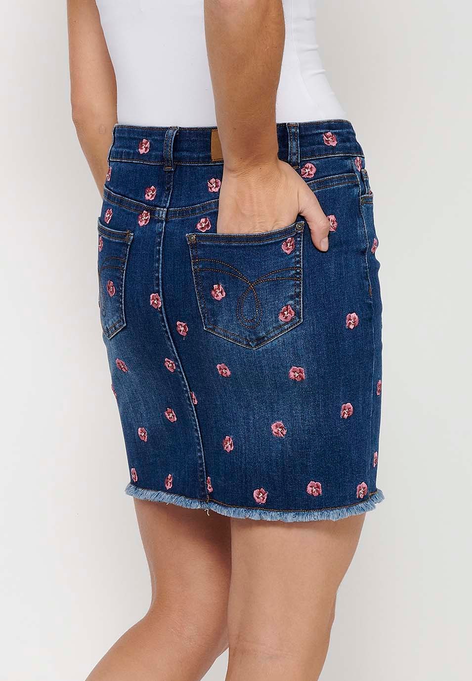 Short denim skirt made of embroidered fabric with front zipper closure and dark blue button for Women 9