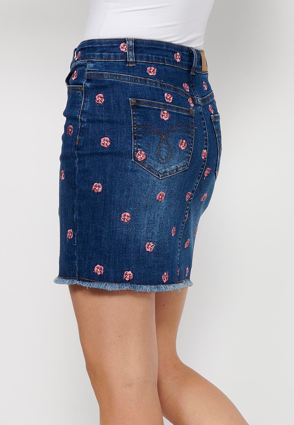 Short denim skirt made of embroidered fabric with front zipper closure and dark blue button for Women 7