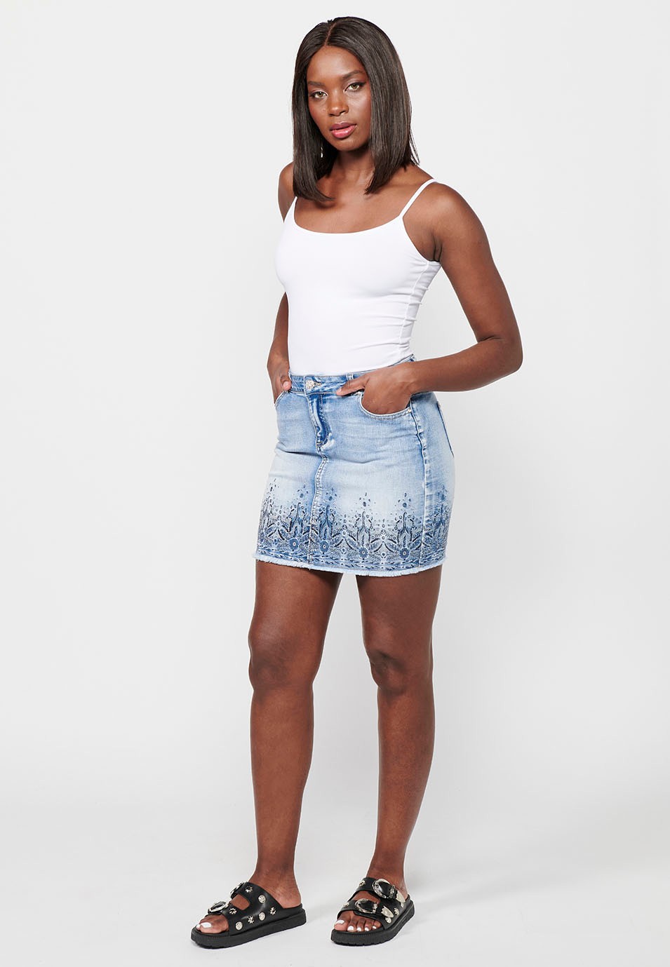 Short denim skirt with embroidered details and front closure with zipper and button in Blue for Women