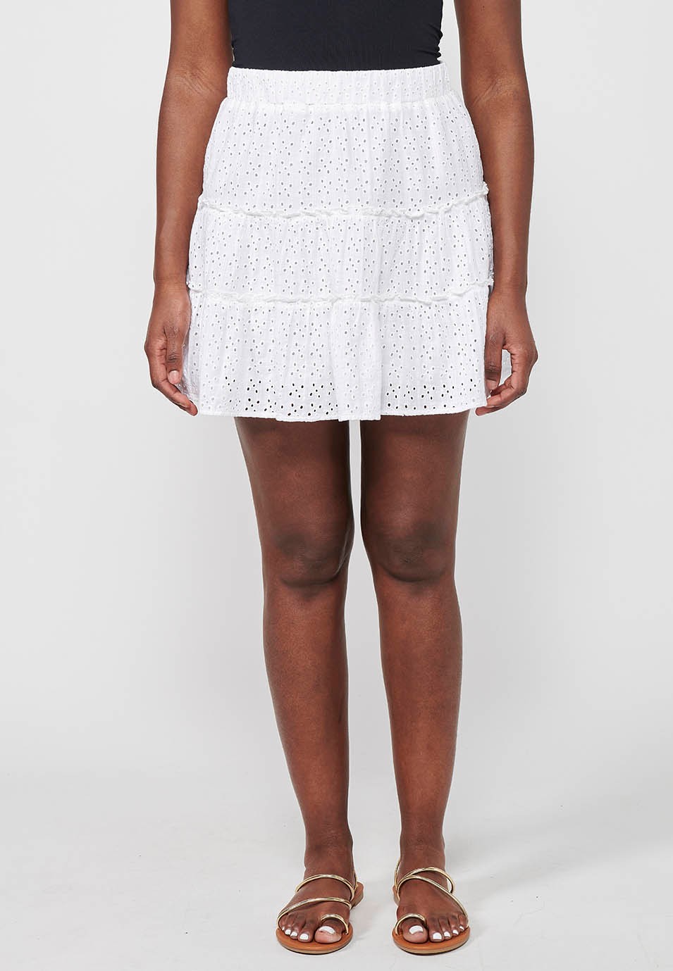 Jupe courte en coton, avec volant et broderie, ajustée à la taille avec élastique, coloris blanc pour femme