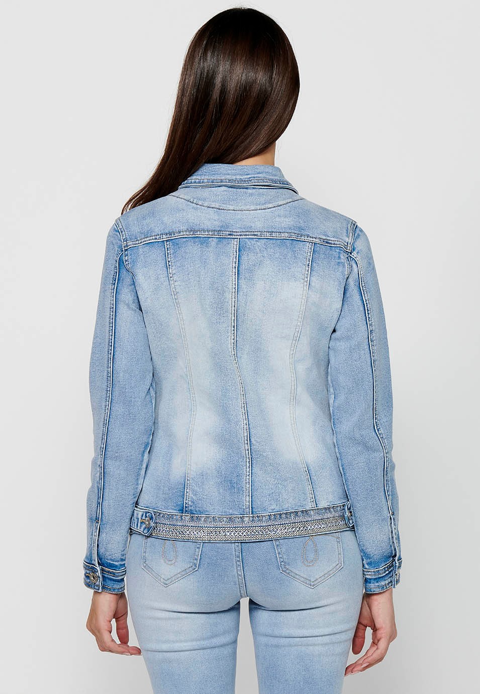 Denim jacket with front closure with buttons and shirt collar with pockets and embroidered details in light blue for women 10