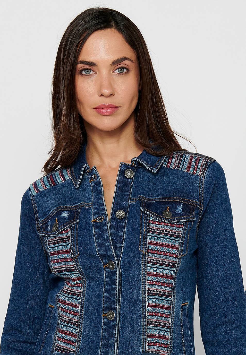 Long-sleeved denim jacket with ethnic fabric detail and front closure with blue buttons for women 1