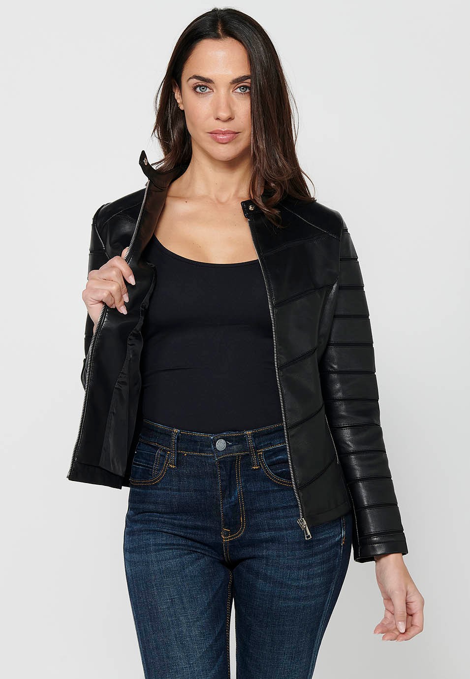 Long-sleeved leather-effect jacket with round neck and cut details. Black Zipper Front Closure for Women