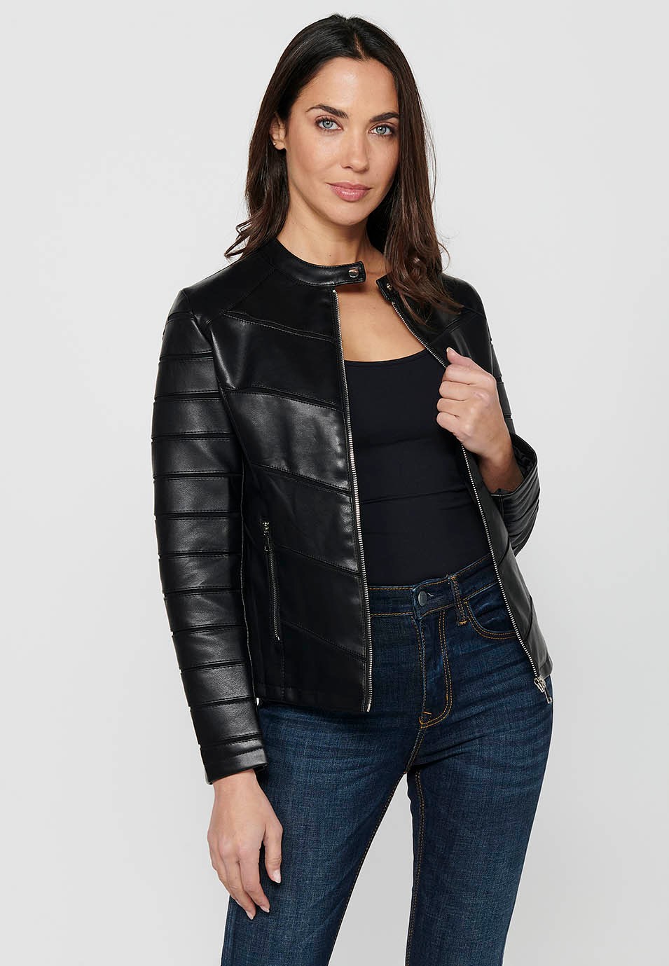 Long-sleeved leather-effect jacket with round neck and cut details. Black Zipper Front Closure for Women