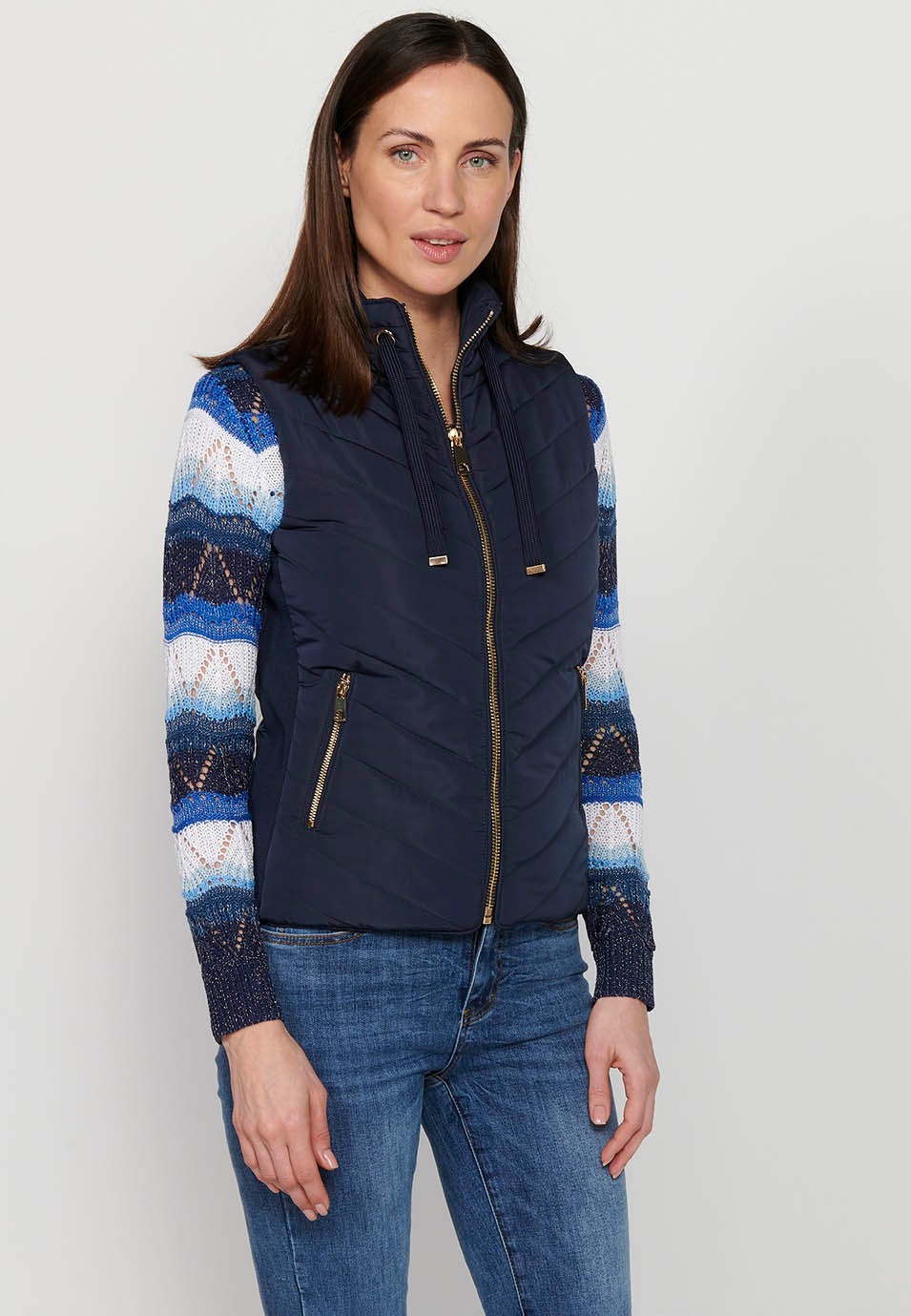 Padded vest with adjustable high neck with drawstring and front zipper closure in Navy for Women