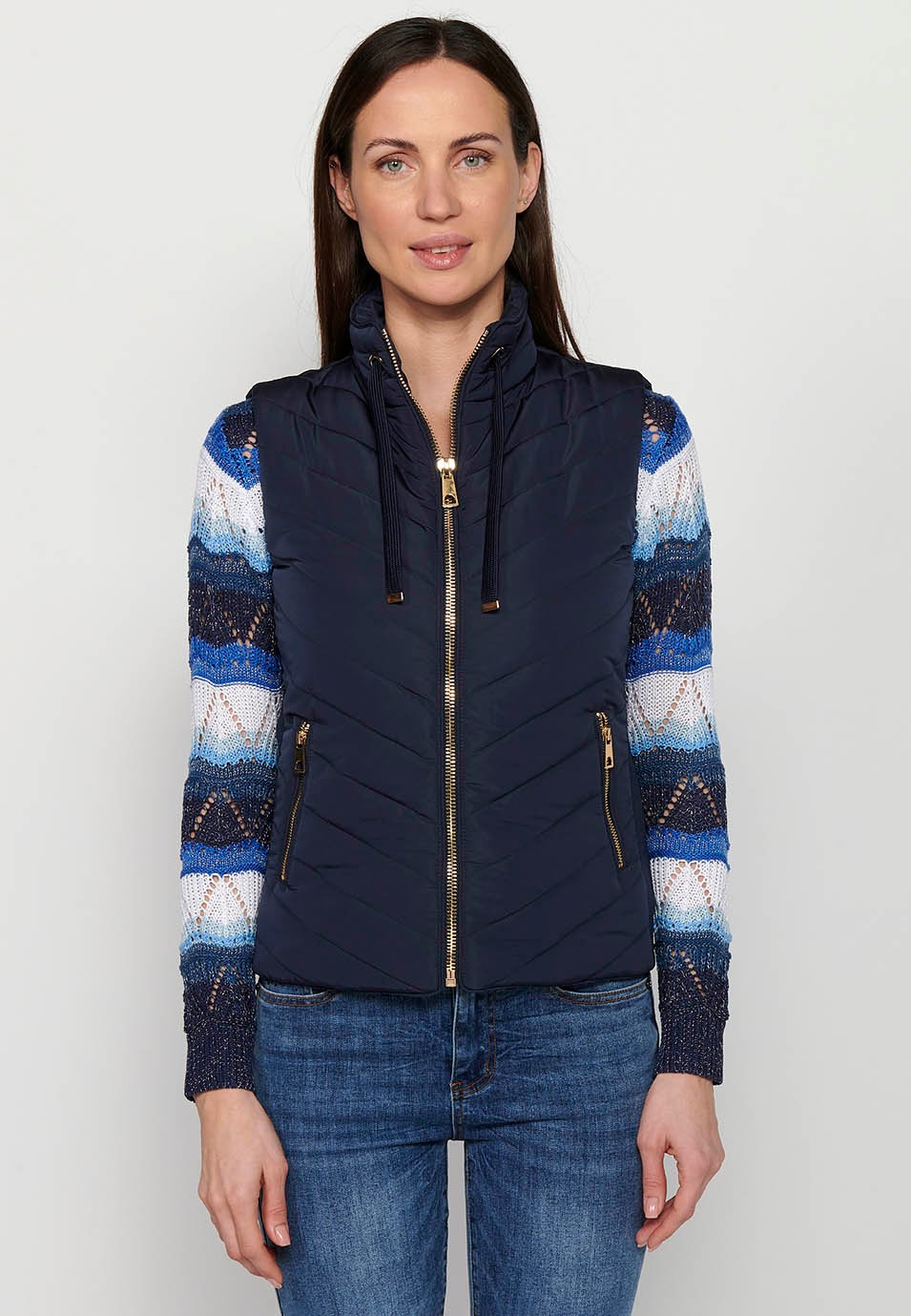 Padded vest with adjustable high neck with drawstring and front zipper closure in Navy for Women