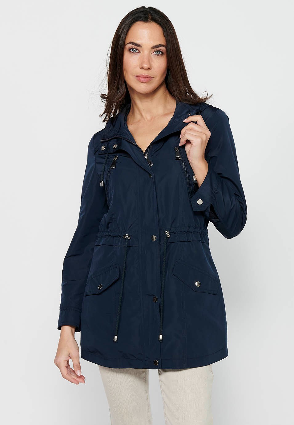 Marineblaue, langärmlige Parka-Jacke mit Reißverschluss vorne und Kapuzenkragen mit Taschen für Damen