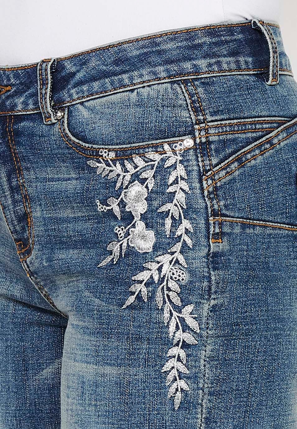 Short shorts with a turn-up finish with front zipper and button closure and blue floral embroidery for Women 9