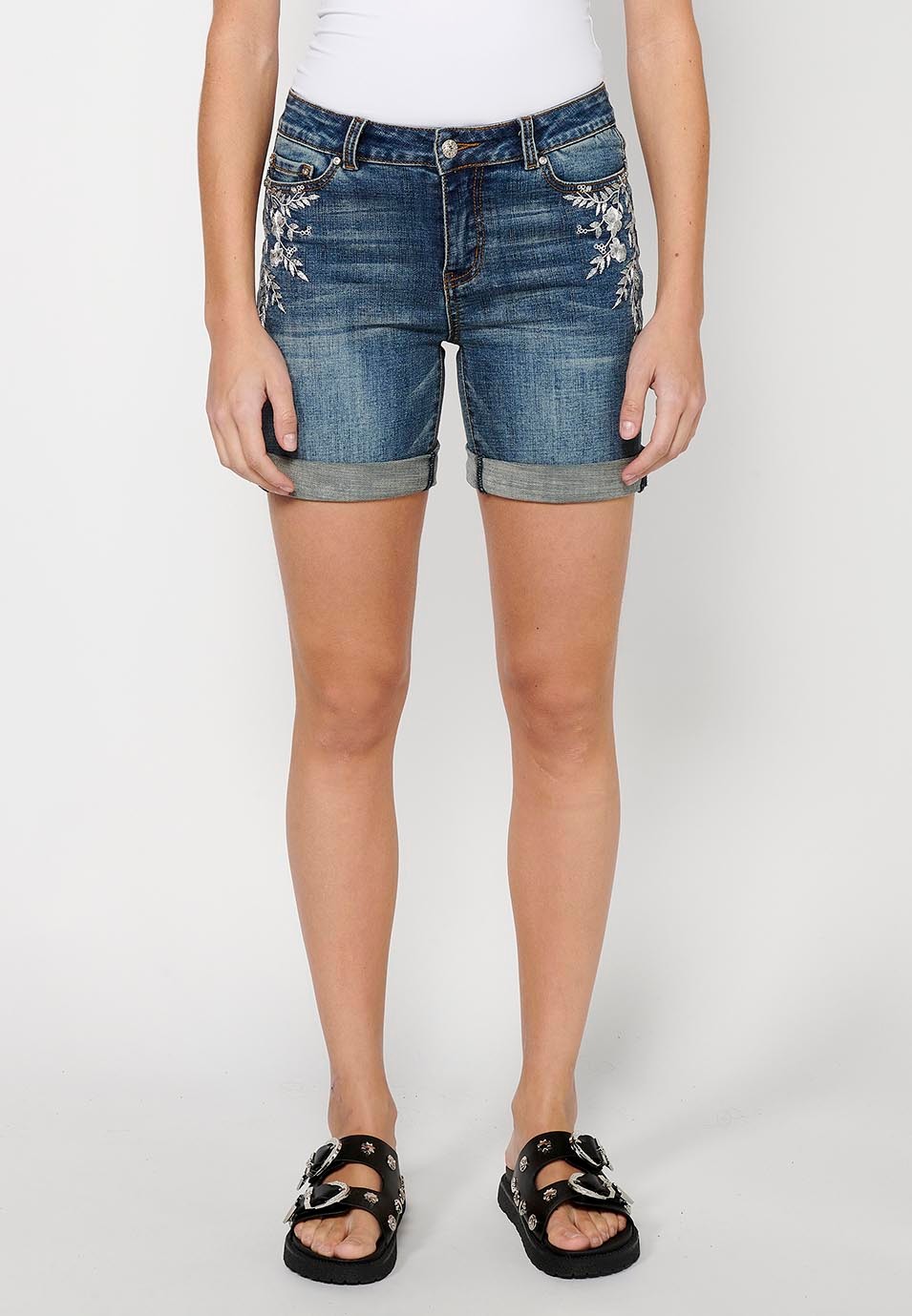 Short shorts with a turn-up finish with front zipper and button closure and blue floral embroidery for Women 3