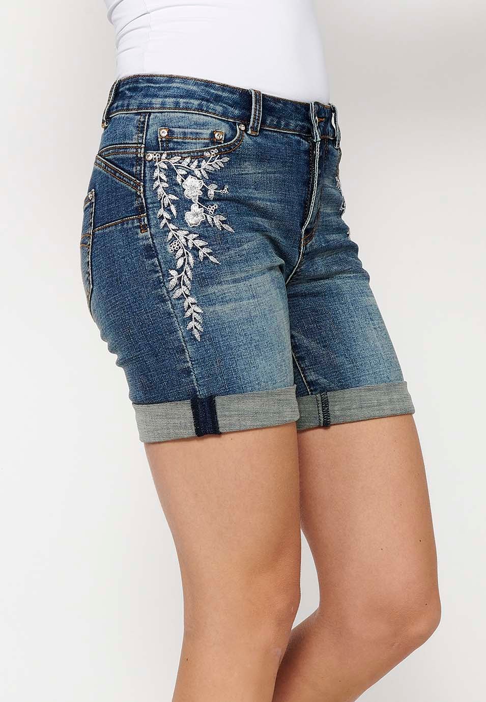 Short shorts with a turn-up finish with front zipper and button closure and blue floral embroidery for Women 4