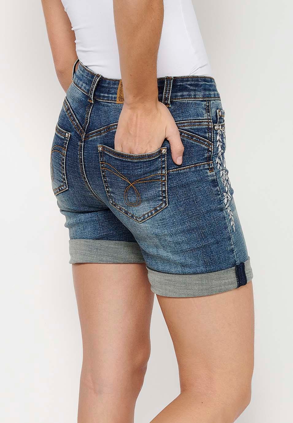 Short shorts with a turn-up finish with front zipper and button closure and blue floral embroidery for Women 8