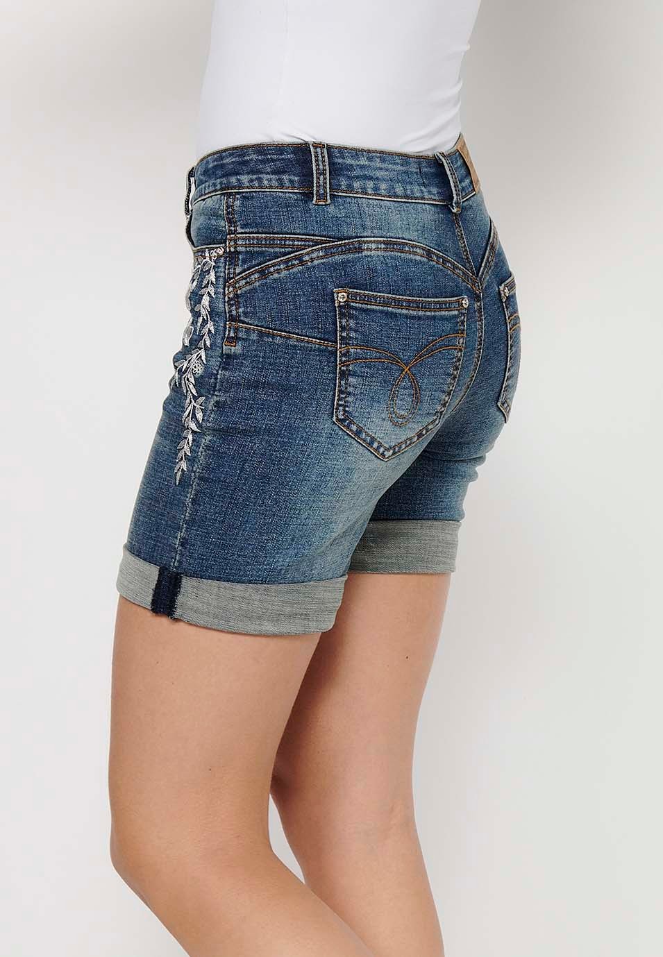 Short shorts with a turn-up finish with front zipper and button closure and blue floral embroidery for Women 6