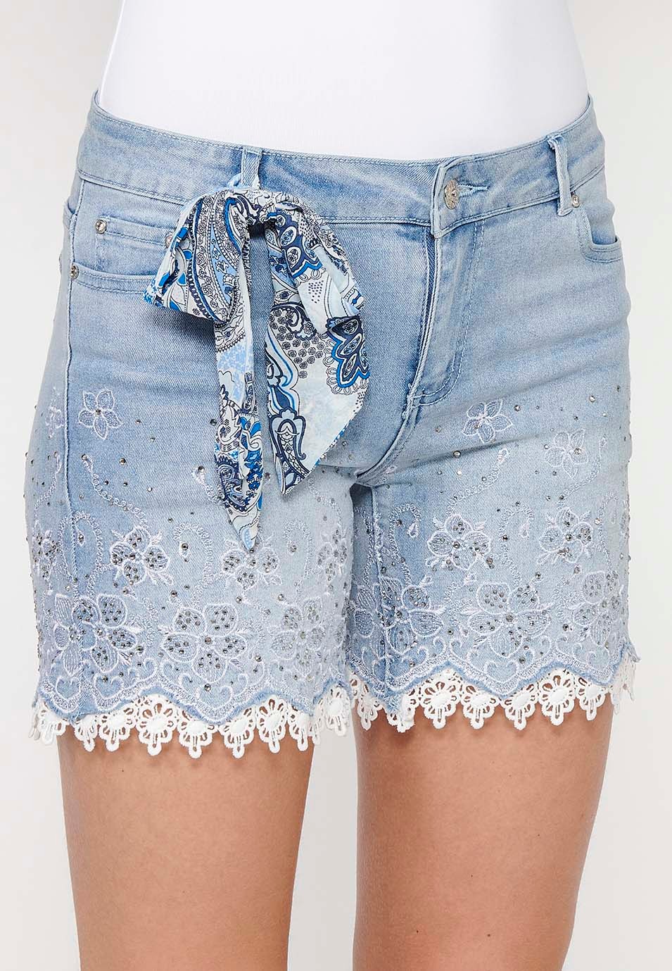 Short denim shorts finished with lace and floral embroidery with front closure with zipper and button with removable bow detail in Blue for Women 6