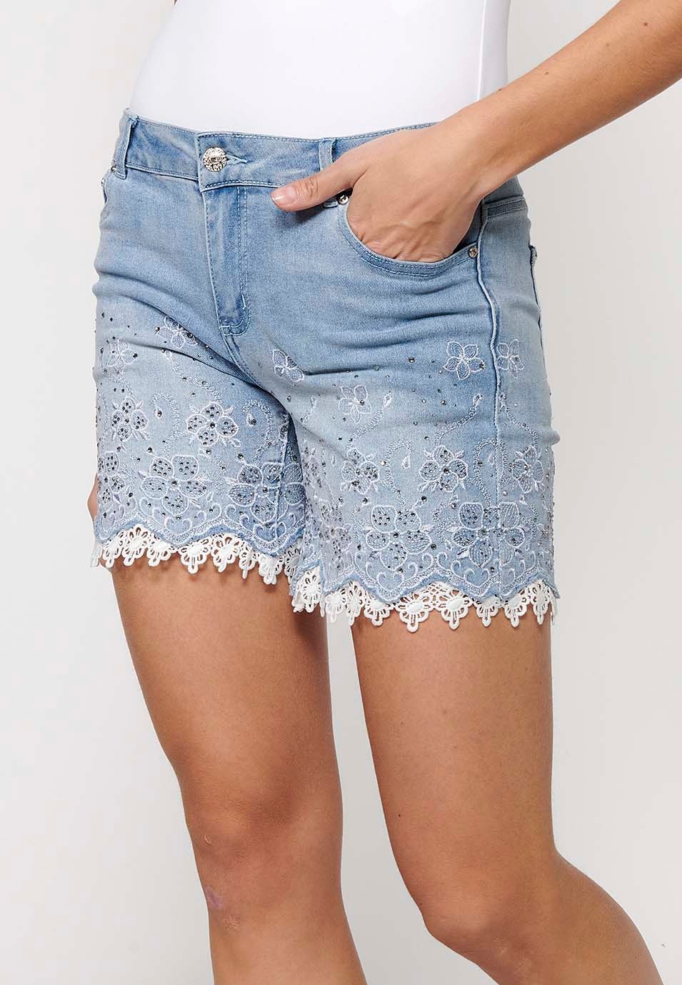 Short denim shorts finished with lace and floral embroidery with front closure with zipper and button with removable bow detail in Blue for Women 4