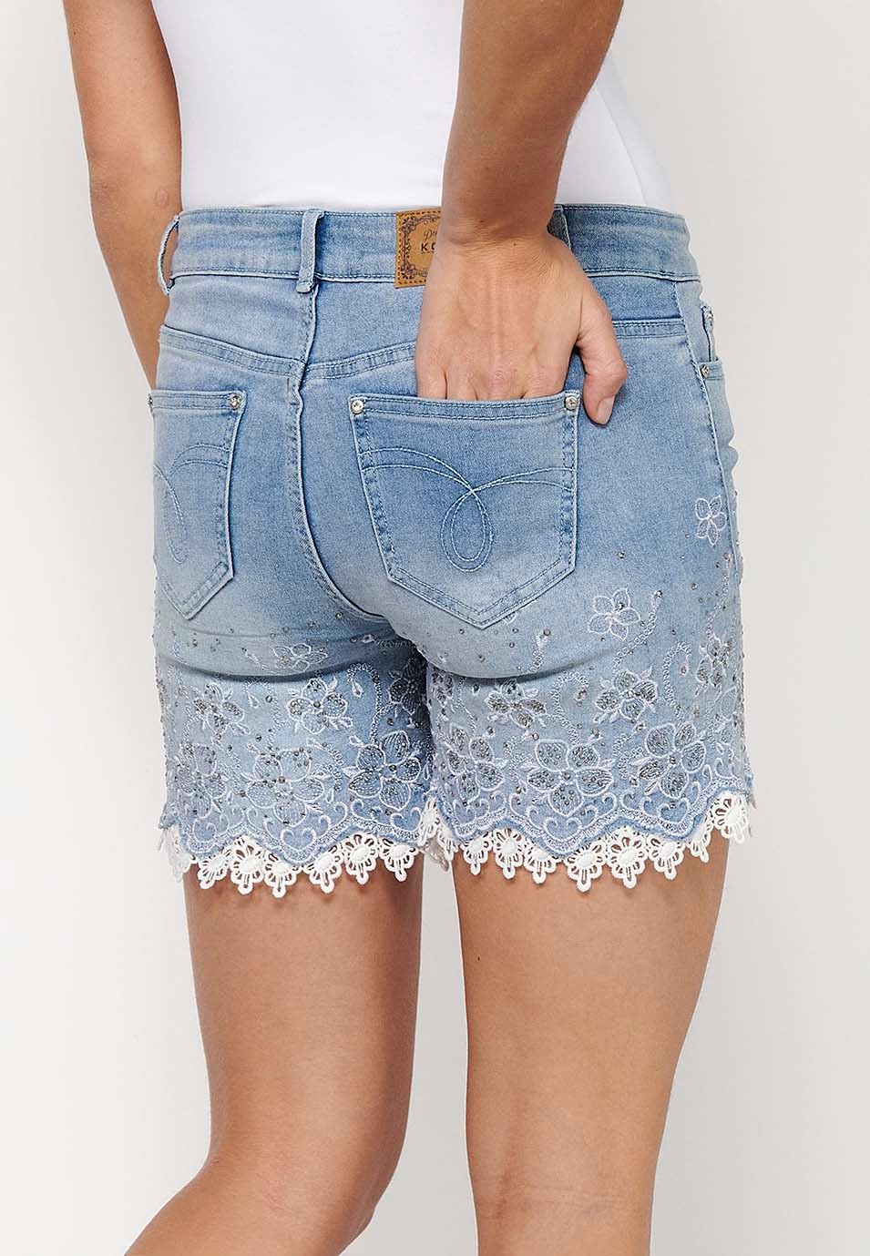 Short denim shorts finished with lace and floral embroidery with front closure with zipper and button with removable bow detail in Blue for Women 1