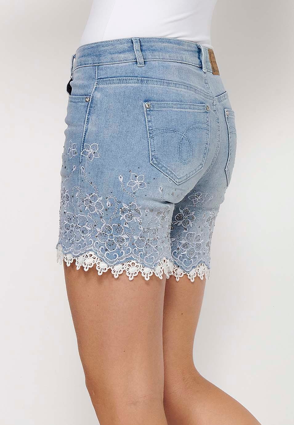 Short denim shorts finished with lace and floral embroidery with front closure with zipper and button with removable bow detail in Blue for Women 8
