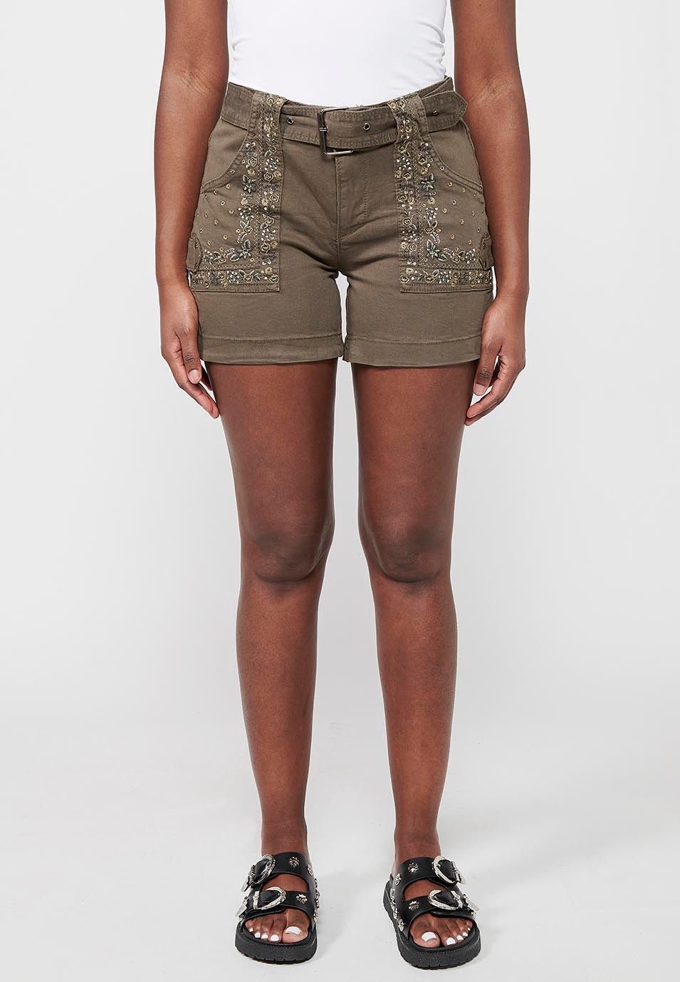 Shorts, pockets with floral embroidery. Adjustable waistband with belt, khaki color for women